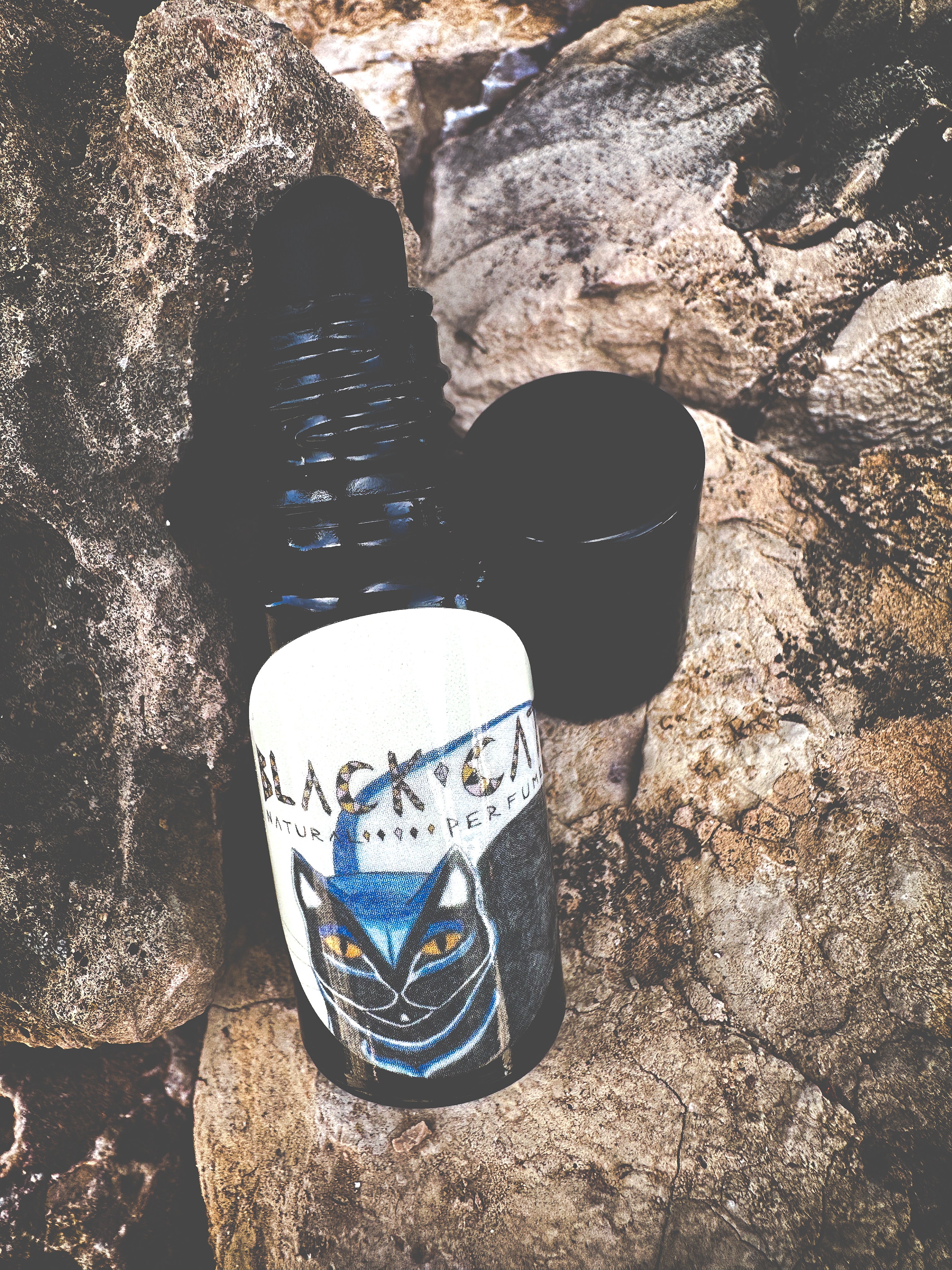 Black Cat. natural forest perfume. smoke, wild clove, lavender, frangipani, herbs, moss. February 2024 - Image 3