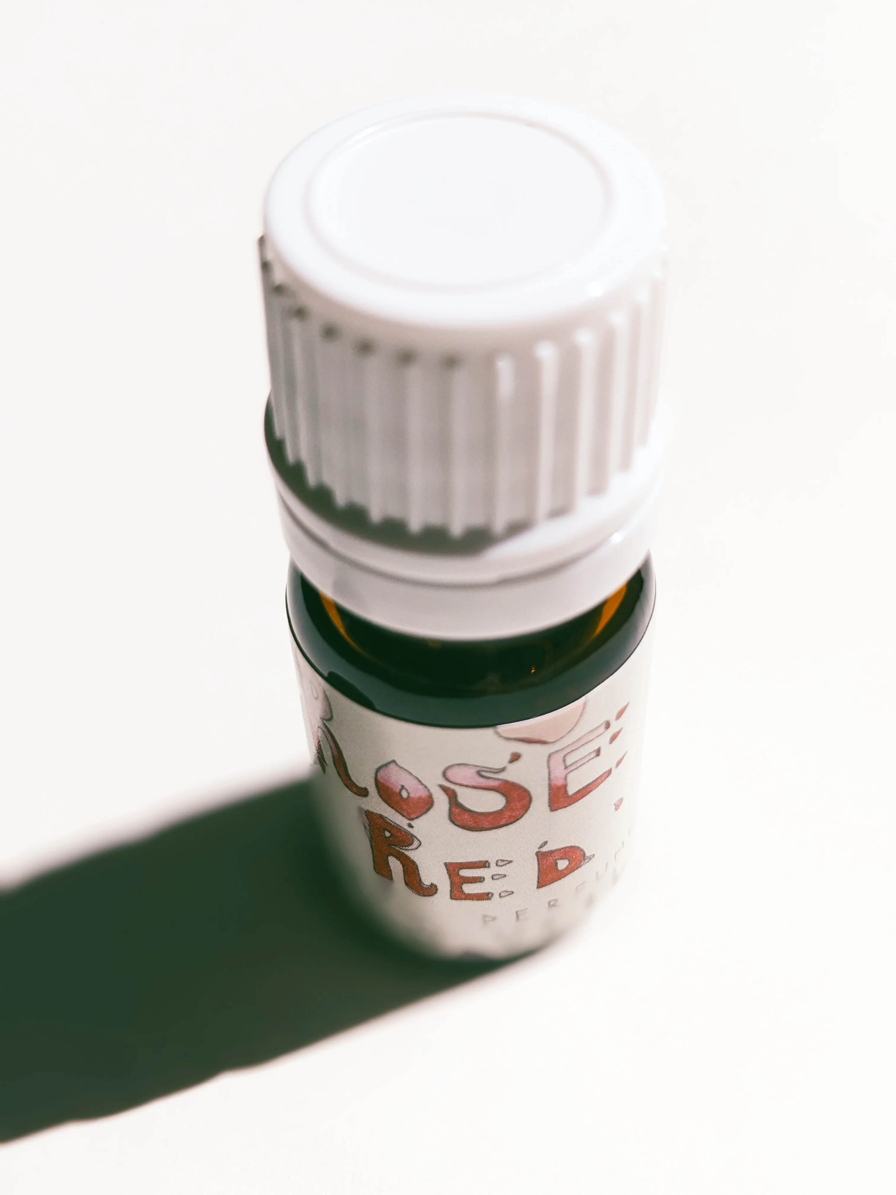 Rose Red. natural perfume. moroccan rose's juicy petals with white sage dust. lapsang souchong smoke, naga resin, dominican sage. May 2023 - Image 13