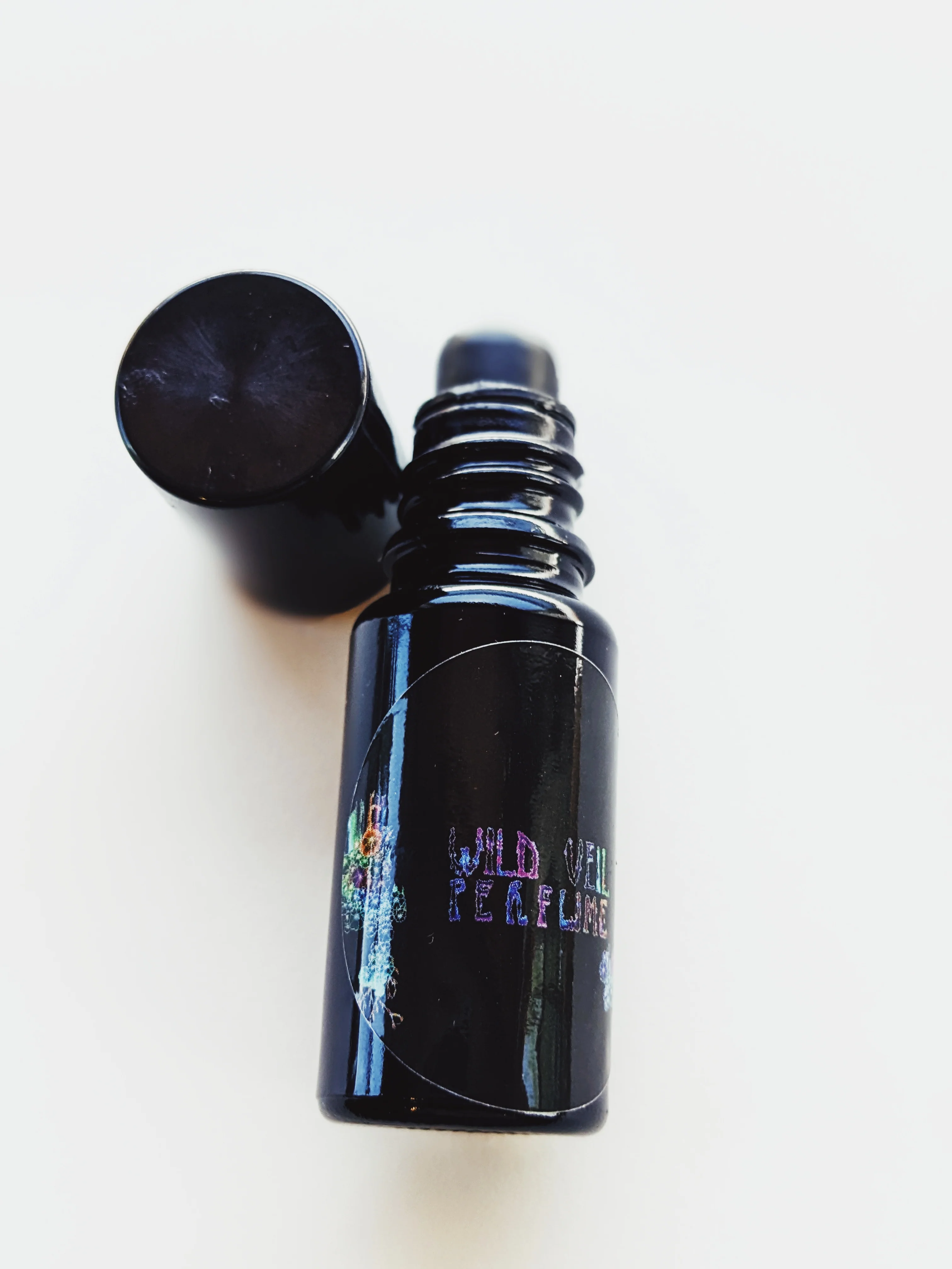 Taurus ♉︎ natural perfume. poppy red citrus, florals, dark resin, pipe smoke. May 2023 - Image 16